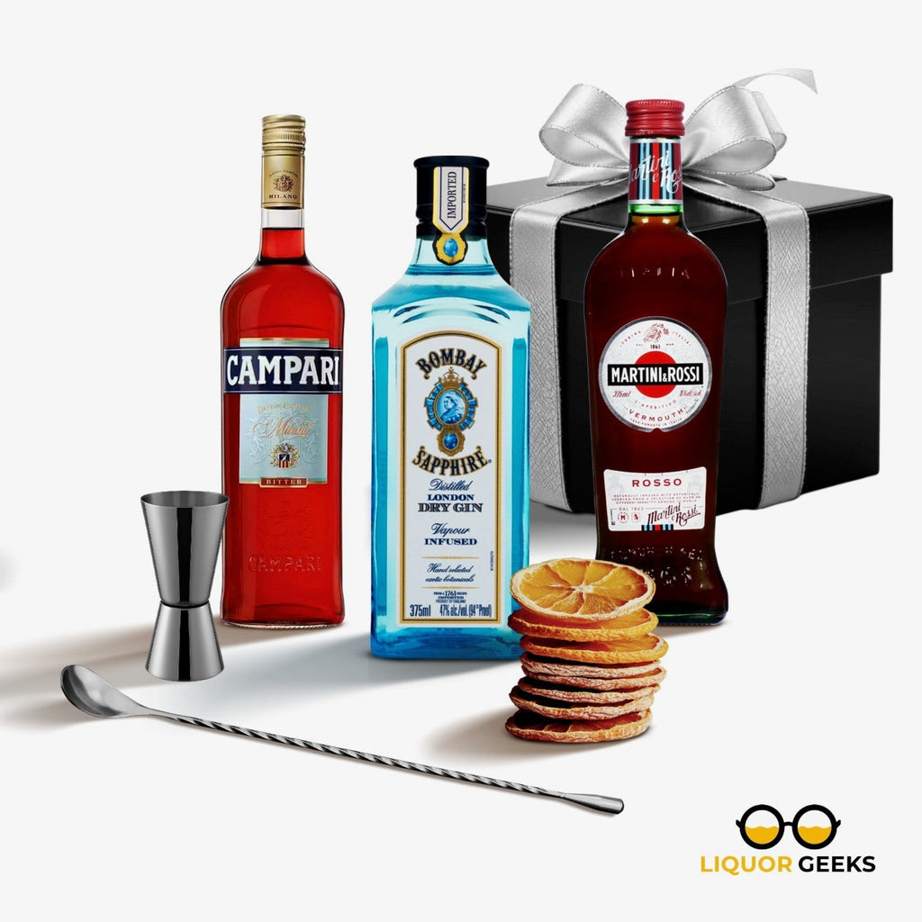 Three liquor bottles with a cocktail shaker, jigger, and cookies on a white background with 'Gifted Pour' branding.